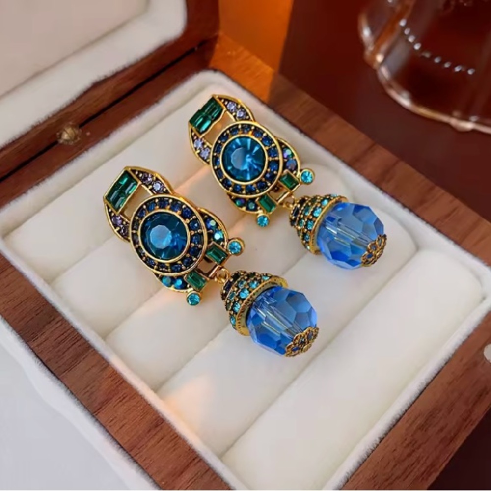Elegant Blue Crystal Clip With Sparkle Charms Earrings. - Picture 4 of 5